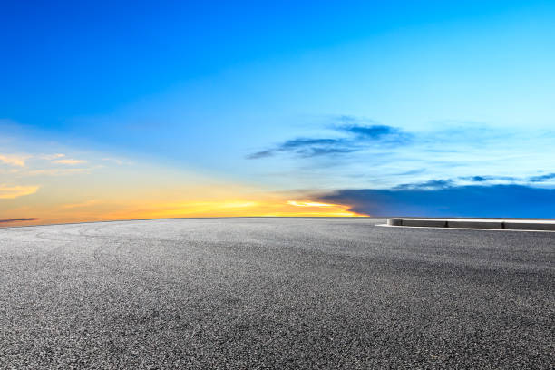 istock Asphalt highway and beautiful sky clouds at sunset 1031822186