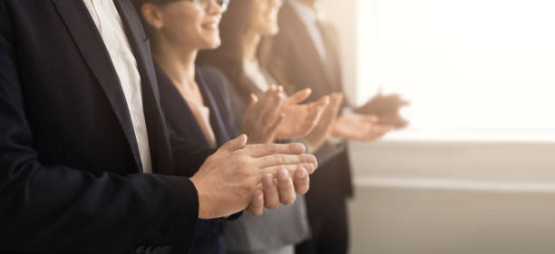 Business people hands applauding at meeting Closeup of business people hands clapping at conference applauding photos stock pictures, royalty-free photos & images
