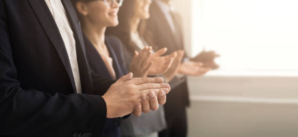 Business people hands applauding at meeting Closeup of business people hands clapping at conference awards ceremony stock pictures, royalty-free photos & images