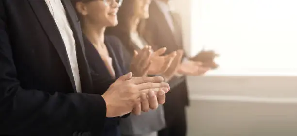 Photo of Business people hands applauding at meeting