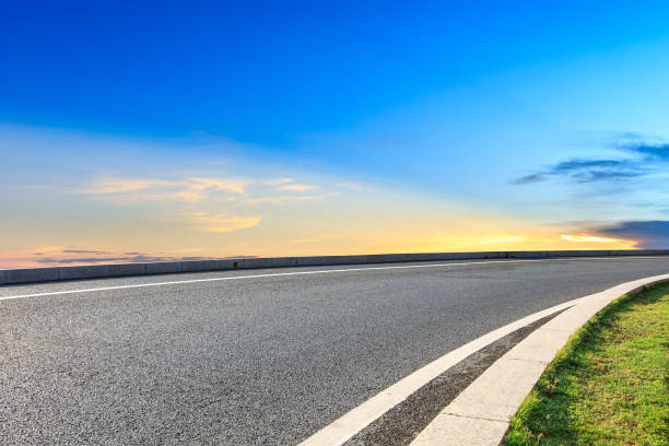 istock Asphalt highway and beautiful sky clouds at sunset 1031822262