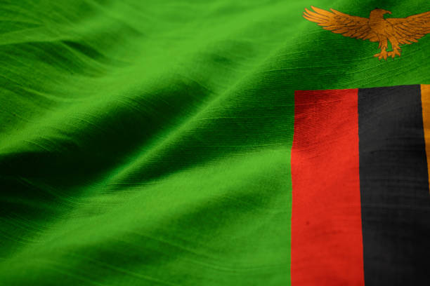 Closeup of Ruffled Zambia Flag, Closeup of Ruffled Zambia Flag, Zambia Flag Blowing in Wind zambia flag stock pictures, royalty-free photos & images