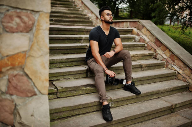 istock Awesome beautiful tall ararbian beard macho man photographer 1031825426