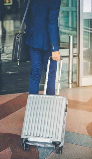 istock Businessmen leave with baggage at the airport. 1031831732