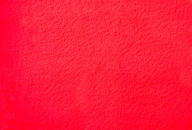 istock Background rough wall, painted with red paint. Abstract texture. Can be used for the design or placement of text and images. 1031837982