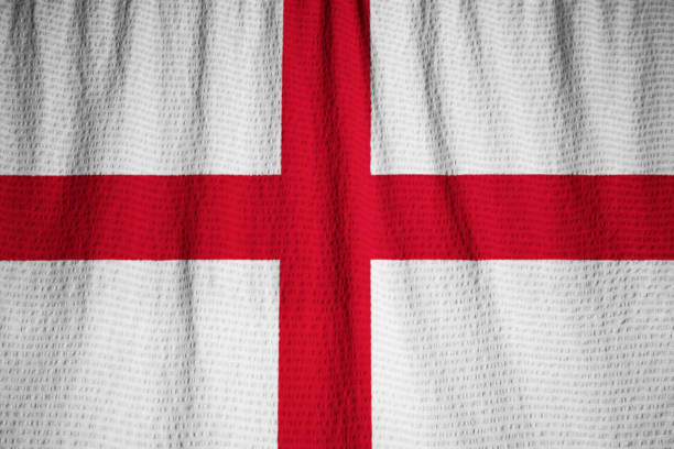 istock Closeup of Ruffled England Flag 1031841116