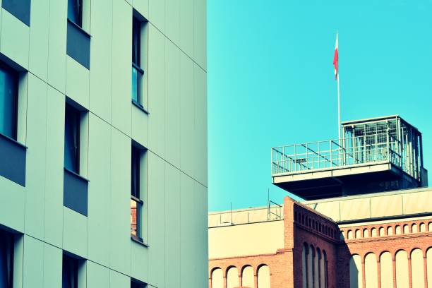 istock Modern apartment building exterior. Retro colors stylization 1031841144