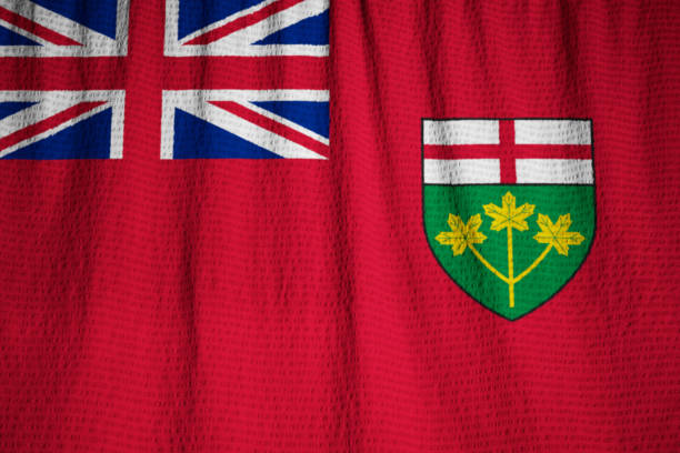 istock Closeup of Ruffled Ontario Flag 1031841668