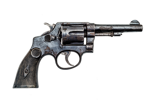 old military police rusty revolver handgun on white background