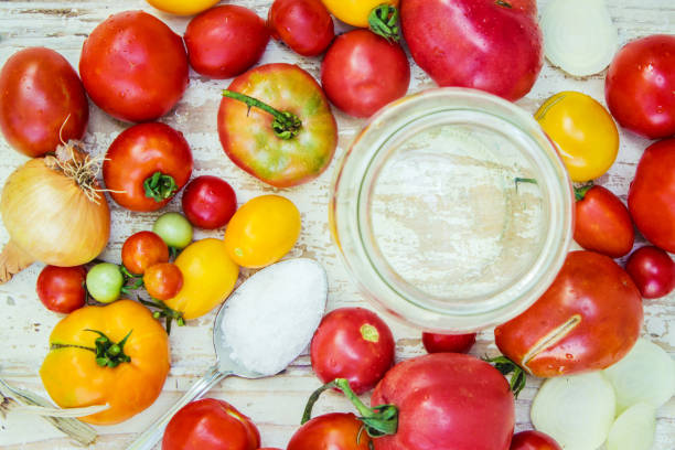 istock Preservation, pickling vegetables of tomatoes and cucumbers. Selective focus. 1031849438