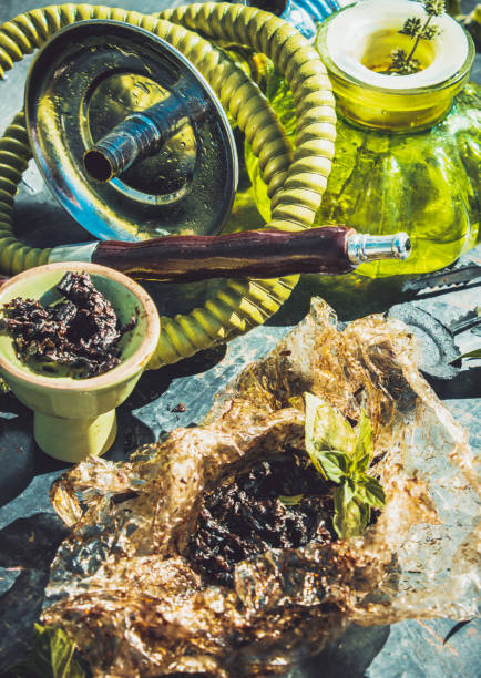 istock collage with hookah tobacco Smoking different taste. 1031853214