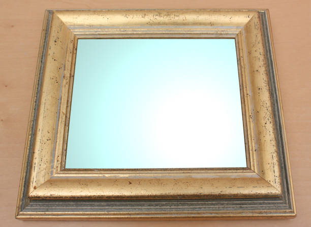 istock Mirror in a golden frame  Reflection of brightness 1031857330