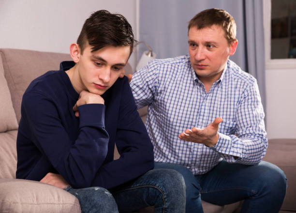 istock Father is wanting talking with his adult son after conflict 1031863128