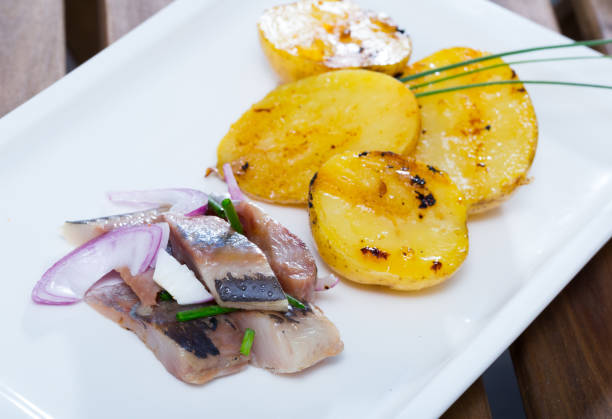 istock Slices of pickled herring 1031863344