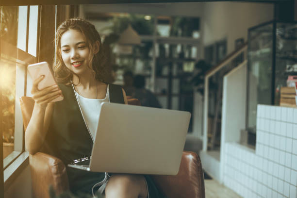istock Confident happiness young woman working on laptop or notebook in her office. 1031887120