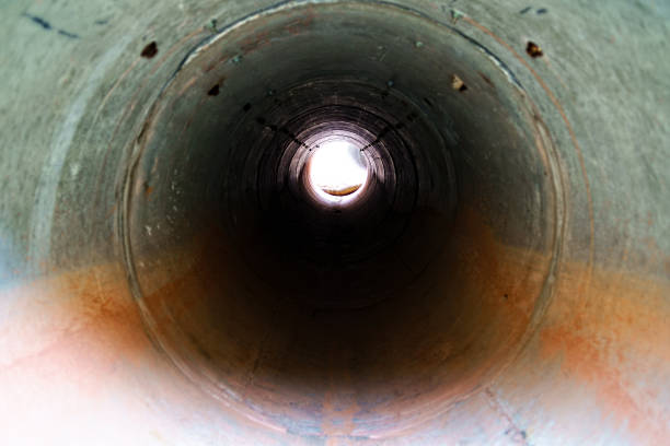 istock Round Tunnel View with Light at the End 1031887234