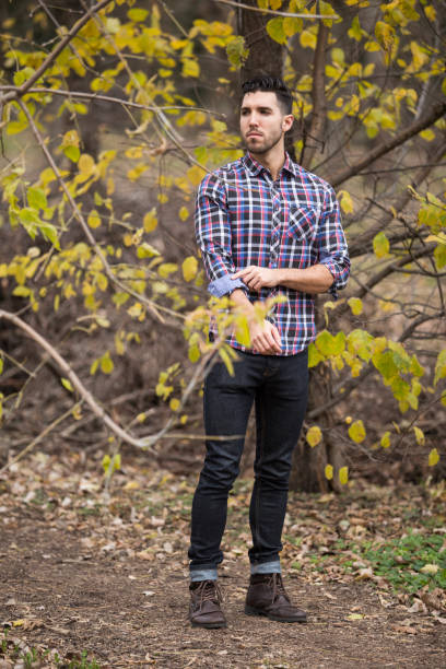 istock young handsome man in nature ,autumn .serious thoughts 1031890384