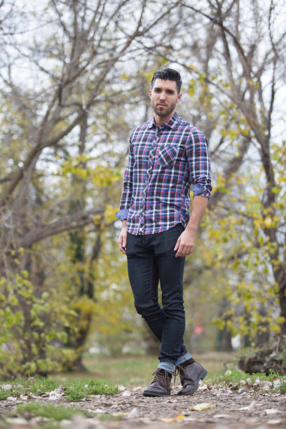 istock young handsome man in nature ,autumn .serious thoughts 1031890396