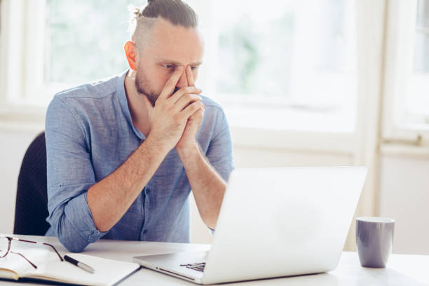 istock Young businessman working on laptop 1031896196