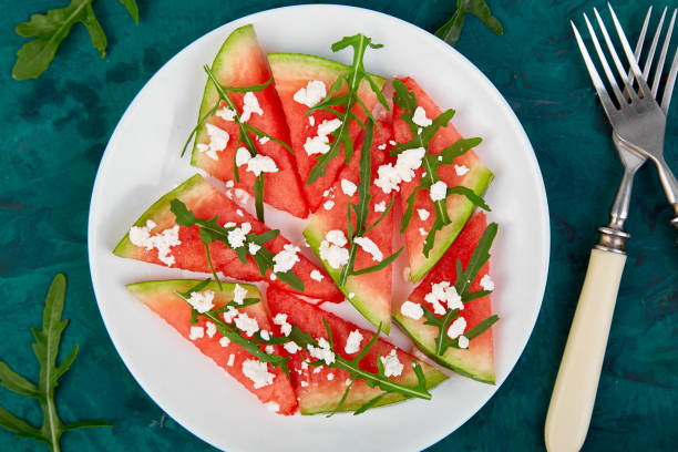 istock Fresh summer watermelon salad with feta cheese and arugula 1031900514