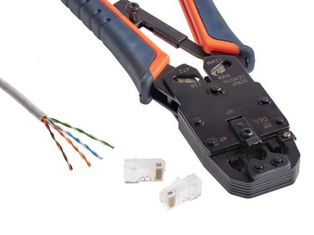 istock RJ45 crimping tool used to attach Ethernet connectors to UTP cable 1031901254