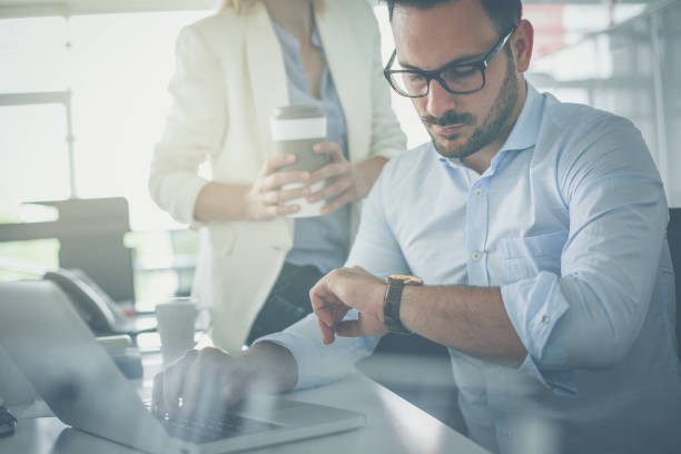 istock Business people working in office. Focus on men. 1031904356