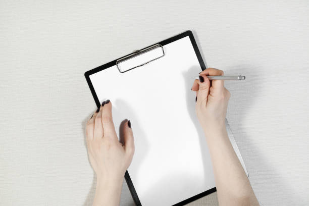istock Paper in female hands 1031905072