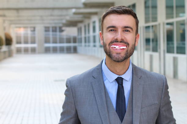 istock Portrait of man smiling to camera 1031908760