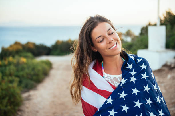 istock Proud female holding the USA flag! 1031913954