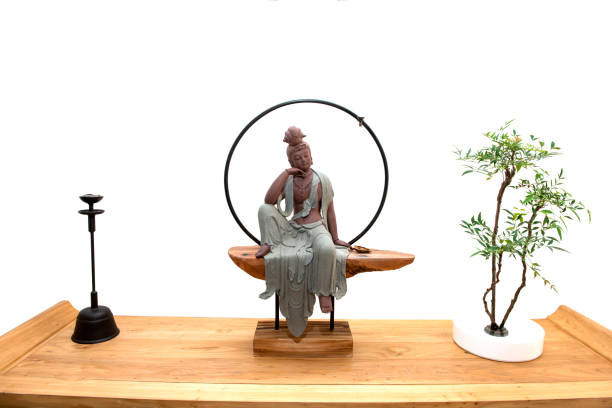 Close up 0f Buddha statue  isolated against white background.