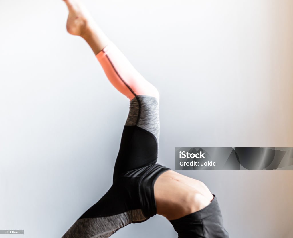 Cropped Ballarina With Raised Up Leg - Bridge Pose, Camatkarasana pose, One legged Wheel pose Acrobat Stock Photo