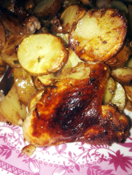istock eating toasted chicken with potatoes 1031916920