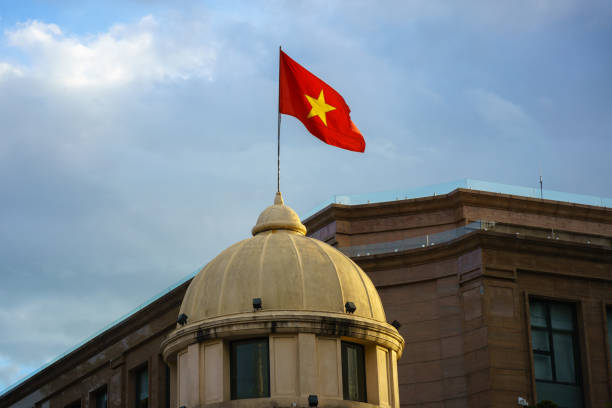 istock Vietnamese National Flag on top of a building 1031920380