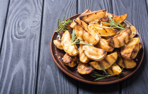 istock Homemade grilled potatoes with rosemary 1031923662