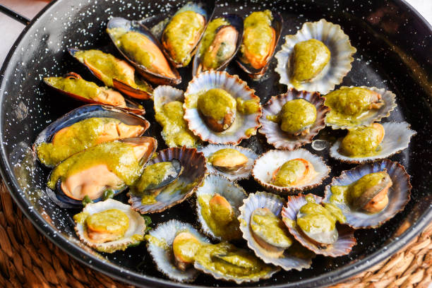 istock Fried mussels in a pan close up 1031928296