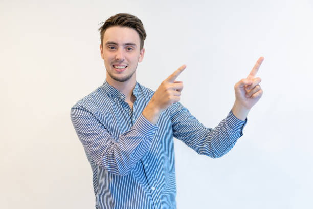 istock Cheerful confident young male manager presenting product 1031928376