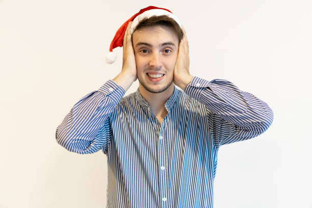 istock Joyful guy enjoying Christmas party 1031932472