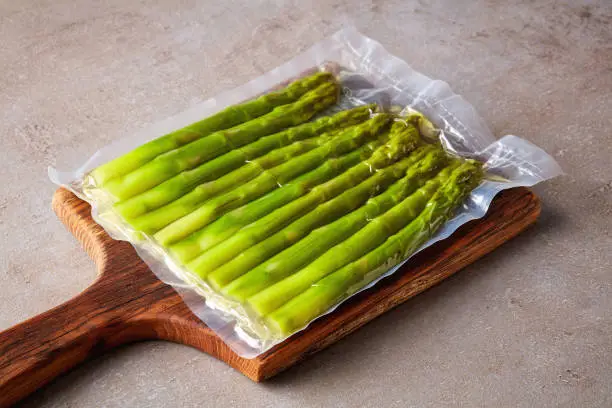 Fresh asparagus vacuum sealed ready for sous vide cooking