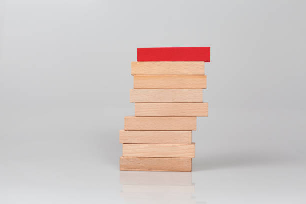 istock Wooden Blocks Arranged as Stair on White Background 1031941264