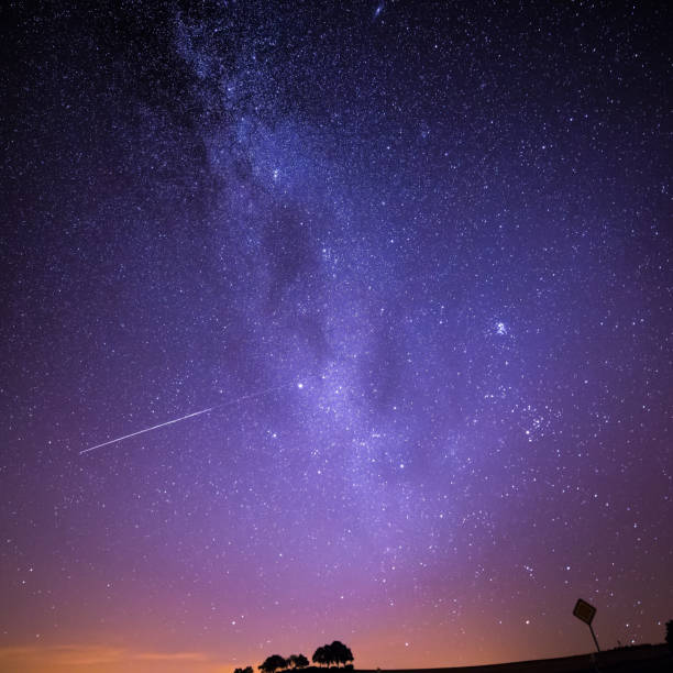 istock Shooting Stars Crossing in Milky Way and Starry Sky before Dawn - Square Version 1031956868