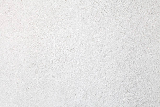белая стена фон - textured textured effect stone plaster стоковые фото и изображения