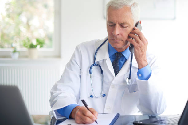 istock Male doctor discussing with his patient 1031968244