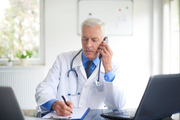 istock Male doctor discussing with his patient 1031968258