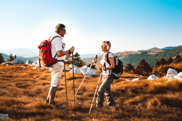 istock Heterosexual senior couple hiking 1031973206