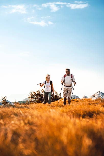 Heterosexual senior couple hiking