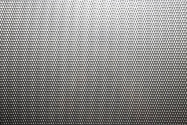 diamond shape pattern on stainless steel. diamond quadrangle on grey steel sheet background and texture. use for interior elevator wall.