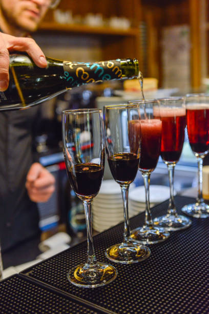 istock Wine pouring into the glasses on bar 1031976044