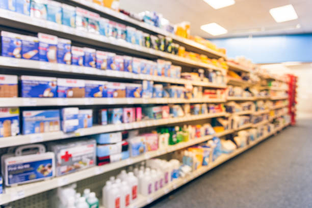 istock Blurry background American pharmacy store with various pharmaceutical and medicines 1031976412