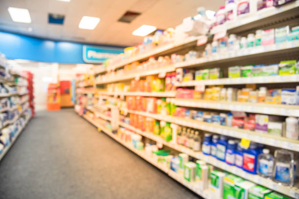 istock Blurry background American pharmacy store with various pharmaceutical and medicines 1031976518