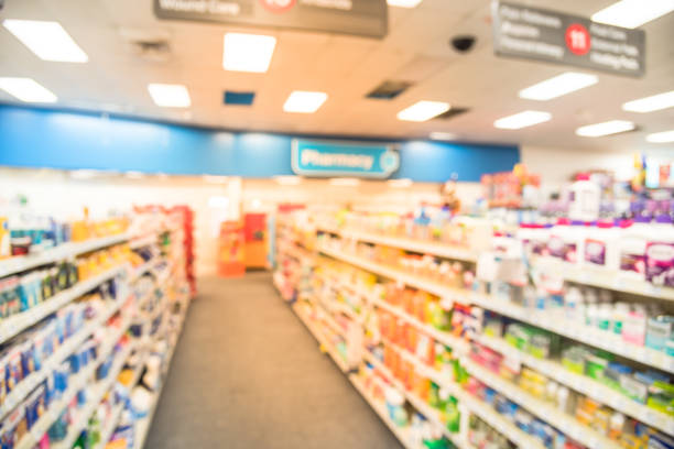 istock Blurry background American pharmacy store with various pharmaceutical and medicines 1031979096